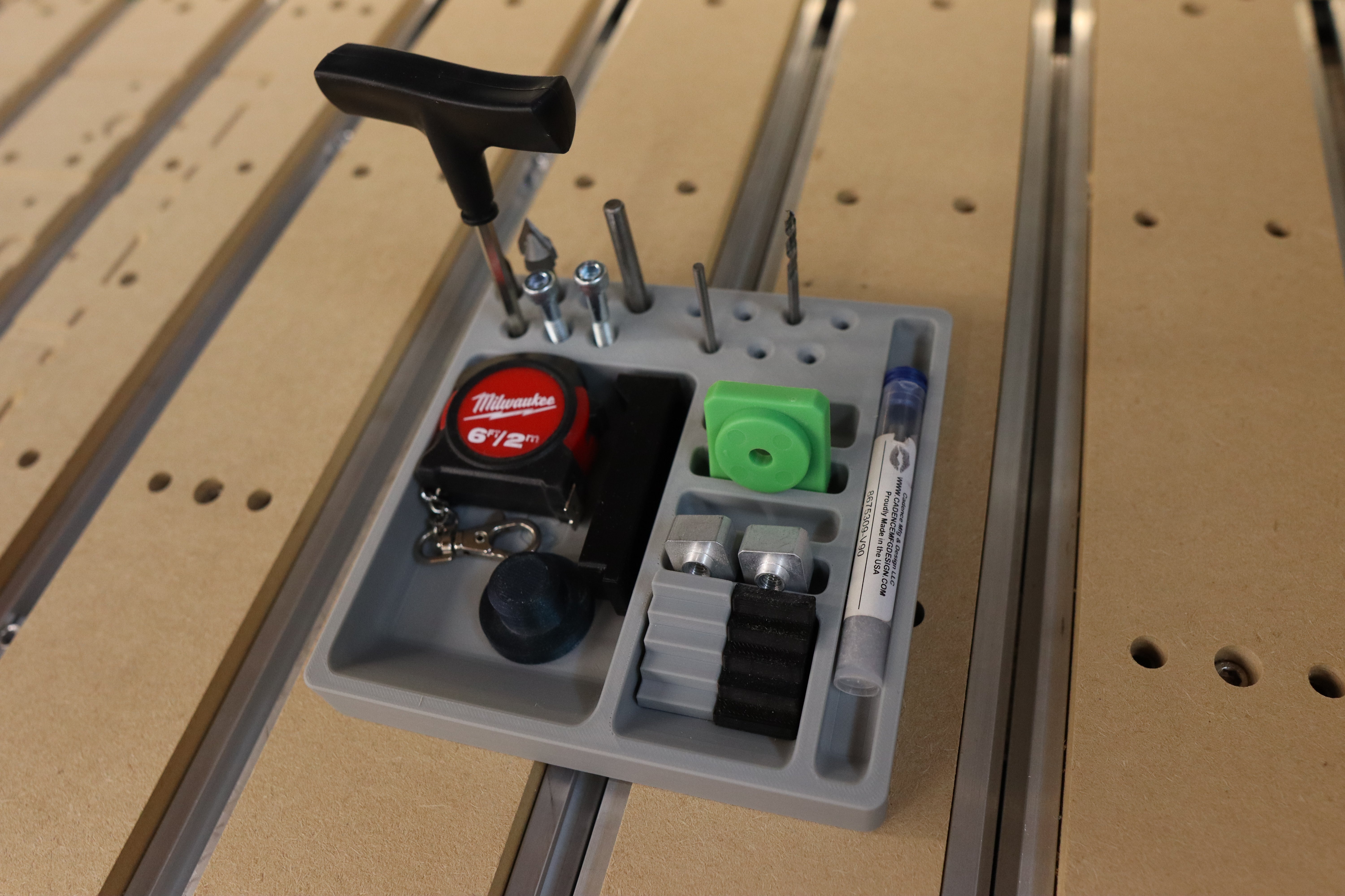 Tool holder with various tools on a wooden surface